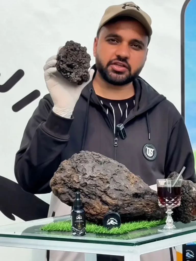 Bilawal Gul holding raw gold-grade shilajit